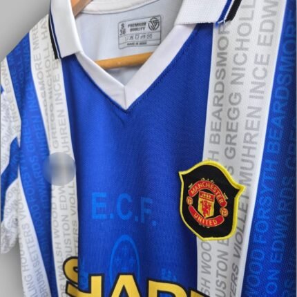 MANCHESTER-BECKHAN-POLO-NECK-JERSEY