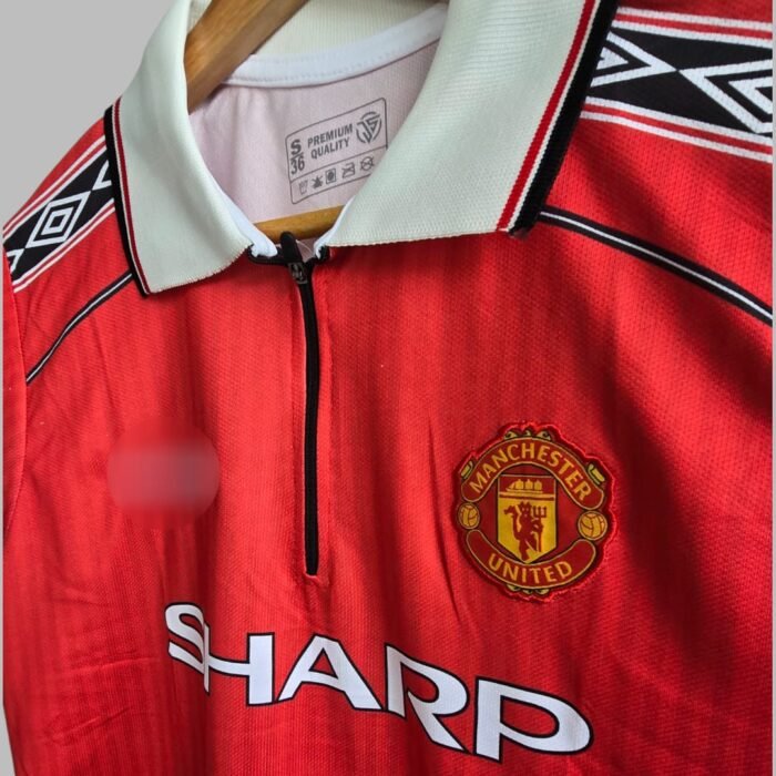 MANCHESTER SHARP BECKHAM POLO NECK RED